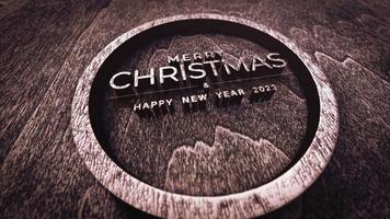 Merry Christmas and Happy New Year 2023 text 3D wood video