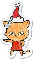 Linda caricatura de pegatina angustiada de un gato vestido con gorro de Papá Noel vector