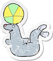 retro distressed sticker of a cartoon seal with ball vector