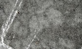 Old Wall damaged with blown Plaster and paint clog,peeling paint damage,water damage on building wall.Grunge abstract background.Wall fragment with scratches and cracks.Old distressed wall backdrop. photo