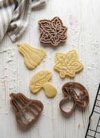 Baking cookies in the form of pumpkin and leaves photo