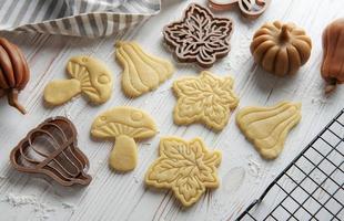 Baking cookies in the form of pumpkin and leaves photo