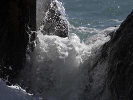 Sea wave on the shore photo