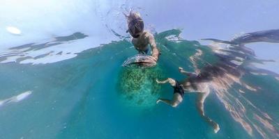 Man while snorkeling in the sea 360 degrees view panorama photo