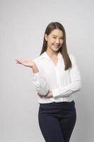 Portrait of beautiful asian woman over white background studio. photo