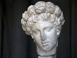 Apollo old roman marble statue photo