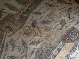 Ancient Roman mosaic of Villa del Casale, Sicily photo