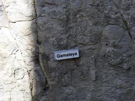 RECCO, ITALY - APRIL 26 2021 - Gamaleya Vaccine name on stone behind the church photo