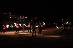 BADIA, ITALY - DECEMBER 31, 2016 - Traditional skiers torchlight procession photo