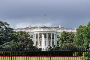 White House building in Washington DC on cloudy day photo