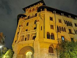 ROME, ITALY - JUNE 14 2019 - Coppede unusual style architechture district in roma buildings at night art nouveau liberty photo