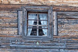 Old wood  mountain cabin hut window photo