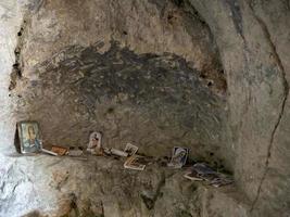 cava d'ispica old church in a cave in sicily italy paintings photo