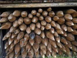 Pointed wood logs pattern photo