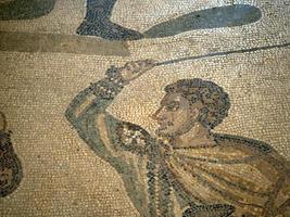 Ancient Roman mosaic of Villa del Casale, Sicily photo