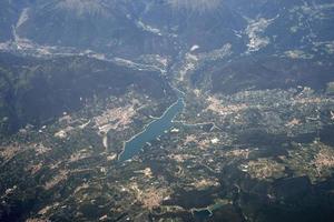 Santa giustina lake aerial view from airplane photo