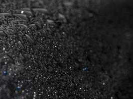 rain drops on blue metal close up macro photo