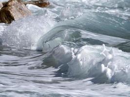 Sea wave on the shore photo