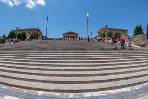 PHILADELPHIA, USA - JUNE19, 2016 - Tourist at Rocky museum of arts flight of steps photo