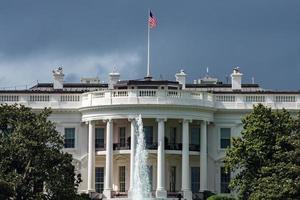 White House building in Washington DC on cloudy day photo