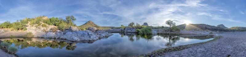 creek in baja california landscape panorama desert of stones at sunrise photo