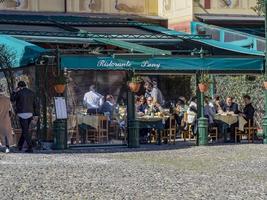 PORTOFINO, ITALY - MARCH 14 2021 - Pictoresque Italian Village crowded the last day before COVID lockdown photo