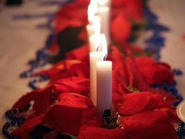 Christmas candles on the table photo