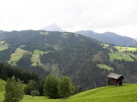 Dolomites panorama on cloudy day photo