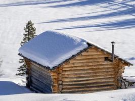 dolomites snow panorama wooden hut val badia armentara photo