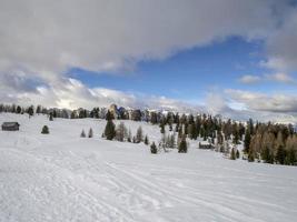 dolomites snow panorama wooden hut val badia armentarola photo