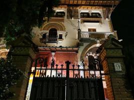 ROME, ITALY - JUNE 14 2019 - Coppede unusual style architechture district in roma buildings at night art nouveau liberty photo