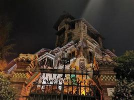 ROME, ITALY - JUNE 14 2019 - Coppede unusual style architechture district in roma buildings at night art nouveau liberty photo