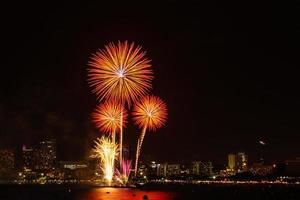 Firework colorful on night city view background for celebration festival. photo