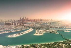 Dubai skyline from Palm Island at sunset photo