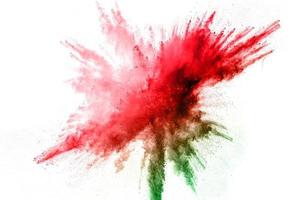 explosión de polvo de color. salpicaduras de polvo de colores. foto