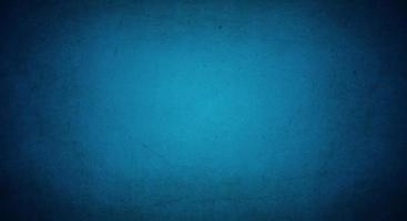 dark blue grunge background with soft lightand dark border, old vintage background photo