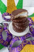 New Orleans Mardi Gras Moon Pie stack with carnival masks photo