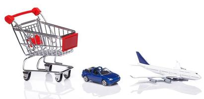 carrito de compras, avión y coche foto