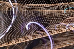 Abstract light line background.Light trails on dark background. photo