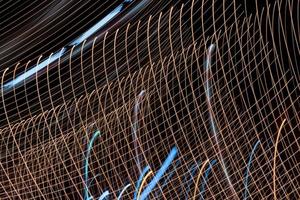 Abstract light line background.Light trails on dark background. photo