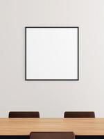 Minimalist square black poster or photo frame mockup on the wall in the office meeting room.