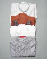 Men's Muslim clothing with various motifs and colors, very suitable for worship. Fashion needs in the month of Ramadan before Eid. focus blur. Moslem fashion mock-up. New clothes for Eid and mudik. photo