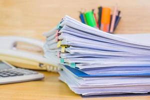 file folder and Stack of business report paper file on the table photo