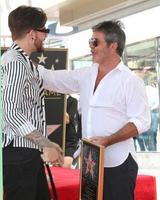 LOS ANGELES  AUG 22, Adam Lambert, Simon Cowell at the Simon Cowell Star Ceremony on the Hollywood Walk of Fame on August 22, 2018 in Los Angeles, CA photo