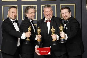 LOS ANGELES, MAR 27 - Brian Connor, Paul Lambert, Gerd Nefzer, Tristan Myles at the 94th Academy Awards at Dolby Theater on March 27, 2022 in Los Angeles, CA photo