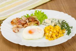 Breakfast with egg and bacon photo