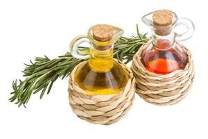 Vinegar, oil and rosemary photo