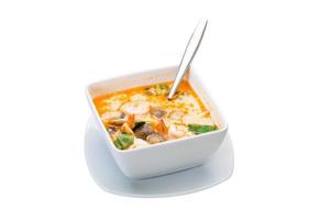 Tom Yam soup on white background photo