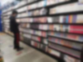 Blurred of Books arranged on shelves, bookshelf in the shop or library, background photo