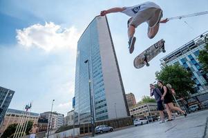 Milan, Italy, 2013-Boy with skateboard at train station photo